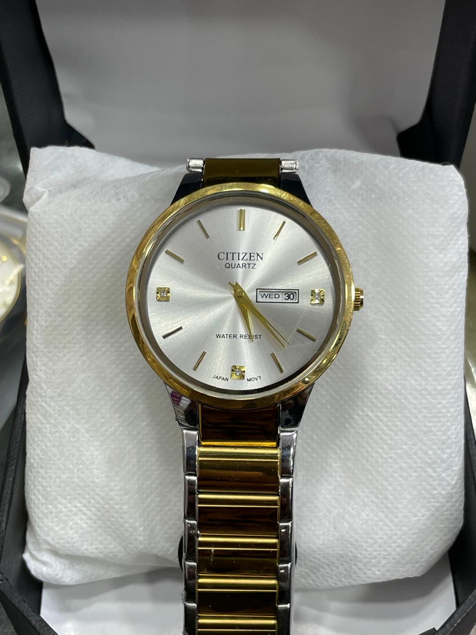 Citizen White Dialer golden Watch